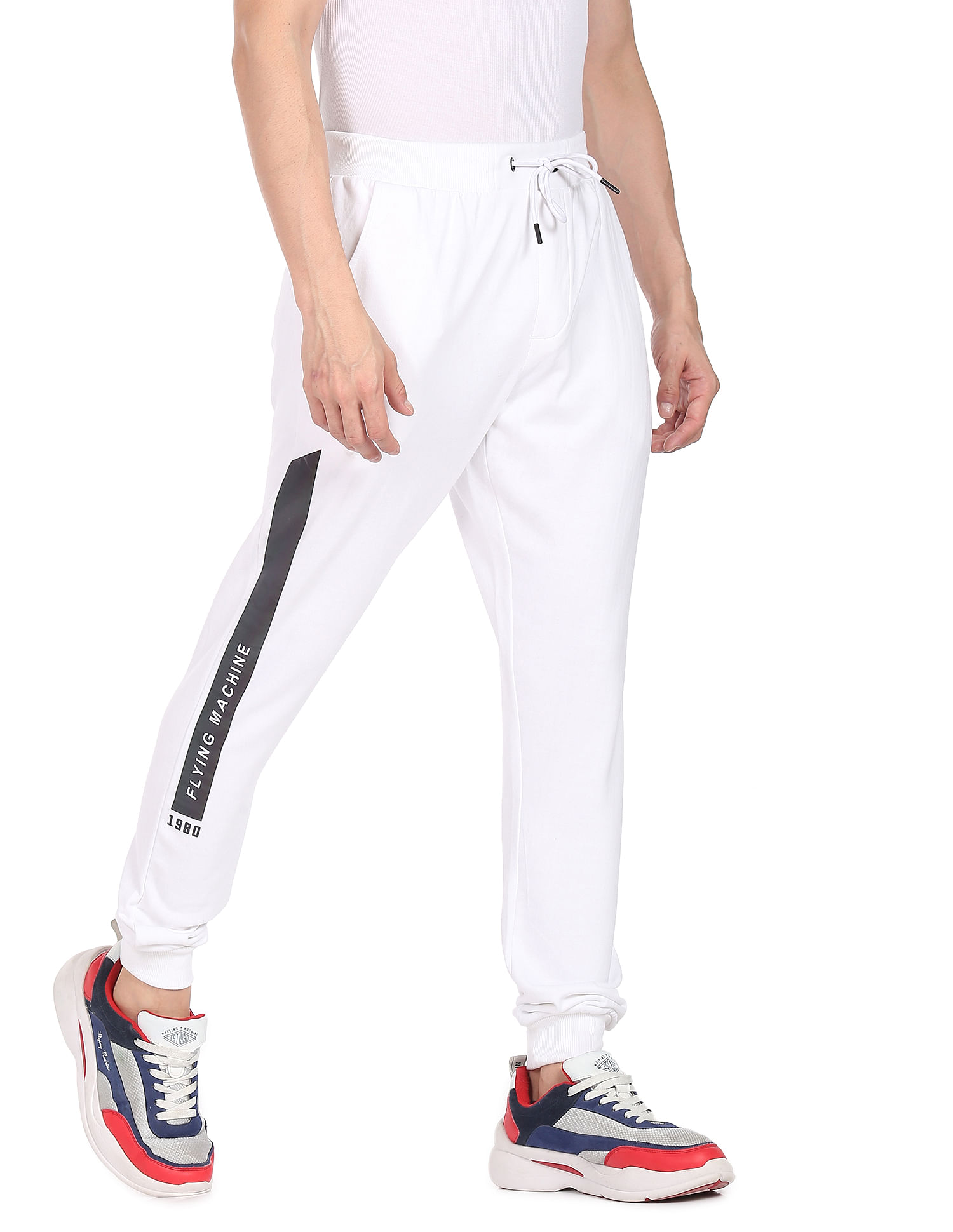 FLYING MACHINE Solid Women Black Track Pants - Buy FLYING MACHINE Solid  Women Black Track Pants Online at Best Prices in India | Flipkart.com
