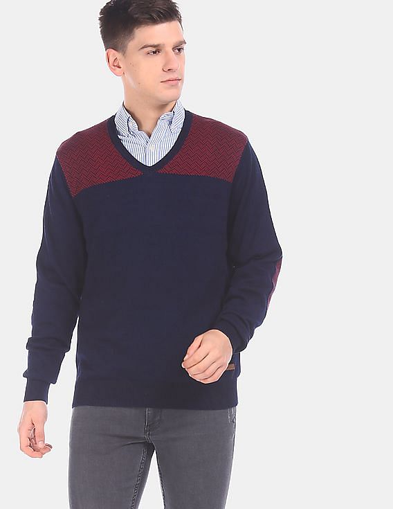 navy sweater with elbow patches