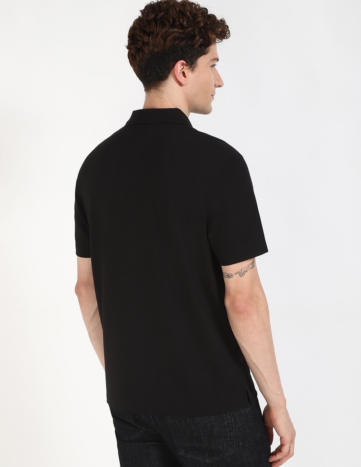 Calvin Klein Jeans Striped Regular-Fit Polyester Polo T-Shirt