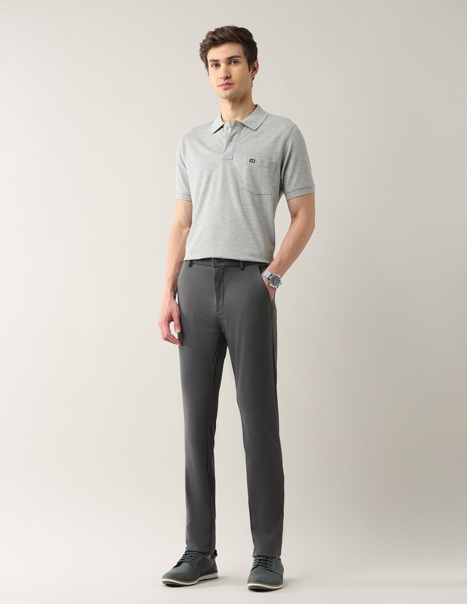 Buy Arrow Sport Slim Fit Solid Anti-Crush Dura Flex Trousers