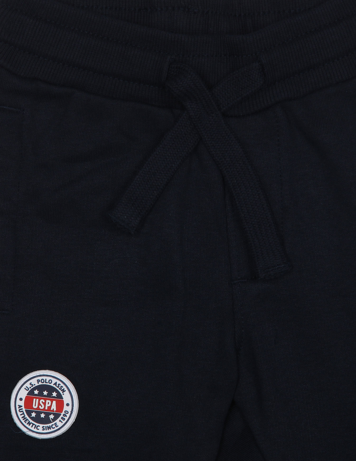 U.S. Polo Assn. Kids Solid Mid Rise Embossed Logo Track Pants