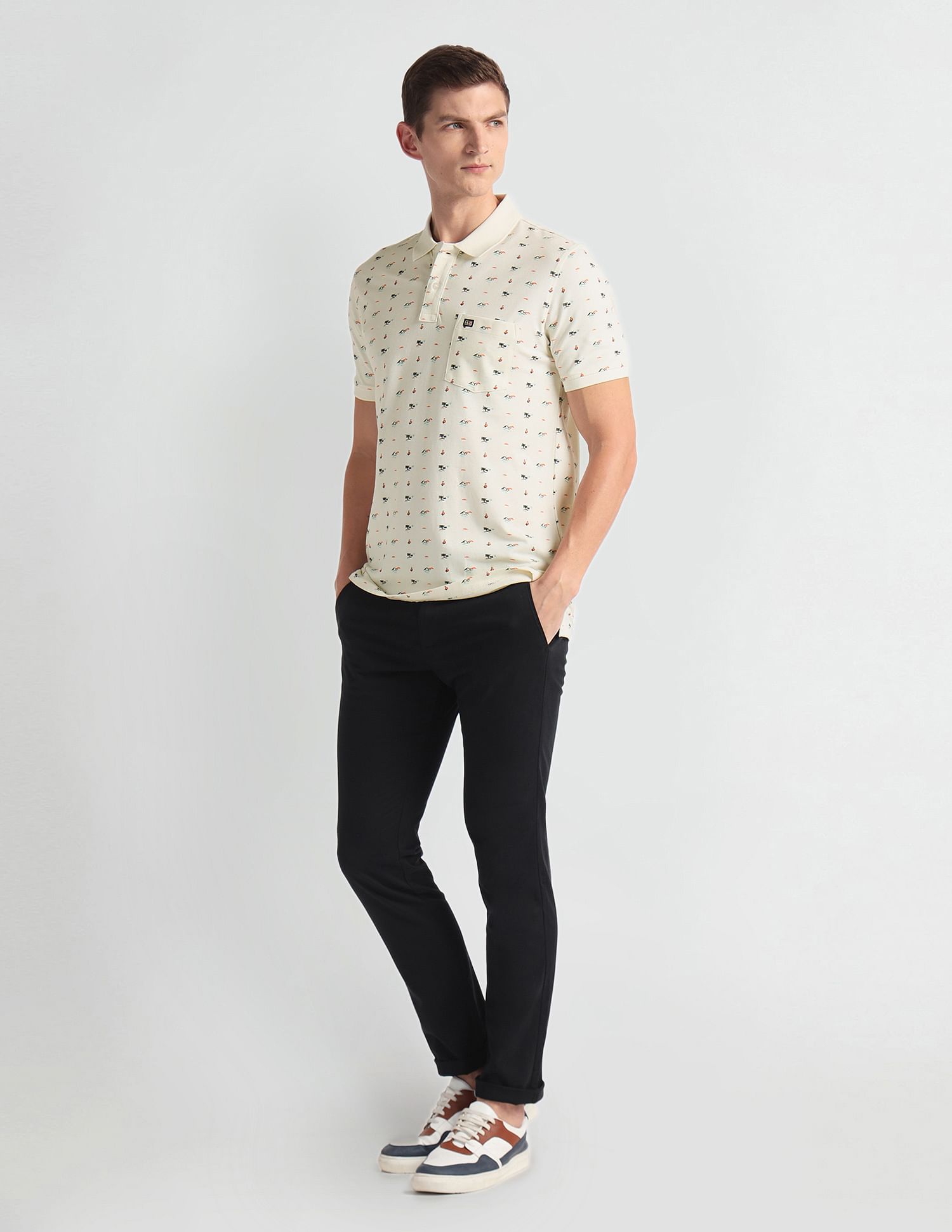 Arrow Sports Ribbed Collar Graphic Print Polo Shirt