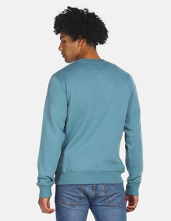 Calvin Klein Men Light Blue Crew Neck Solid Sweatshirt