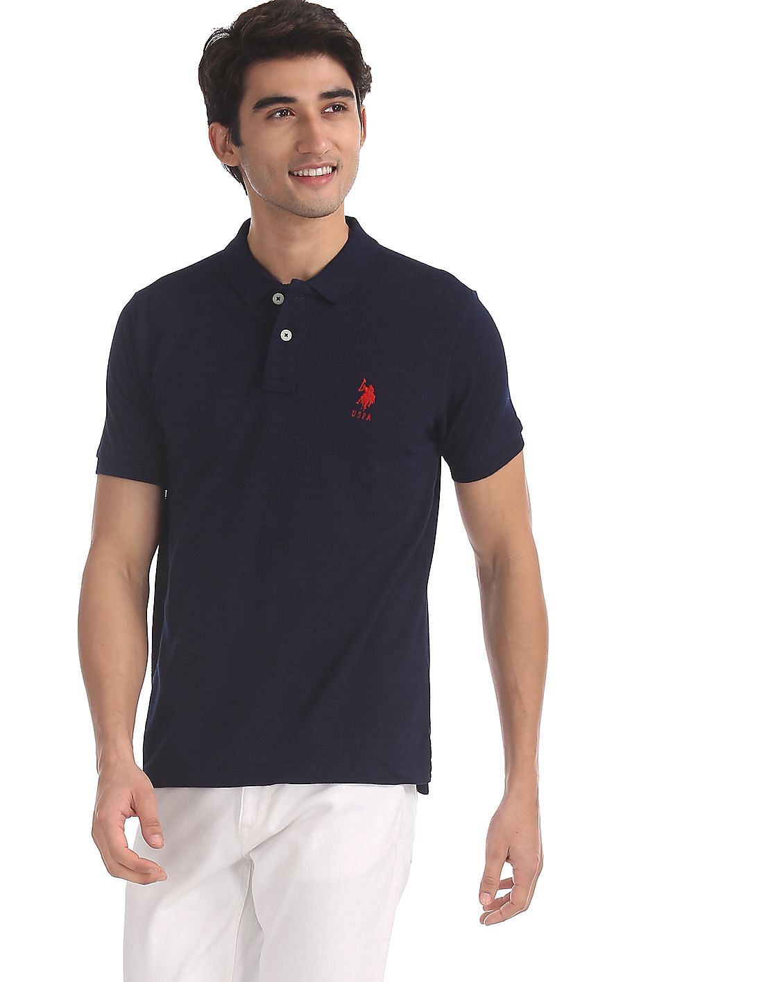 Buy Men Blue Textured Pique Polo Shirt online at NNNOW.com