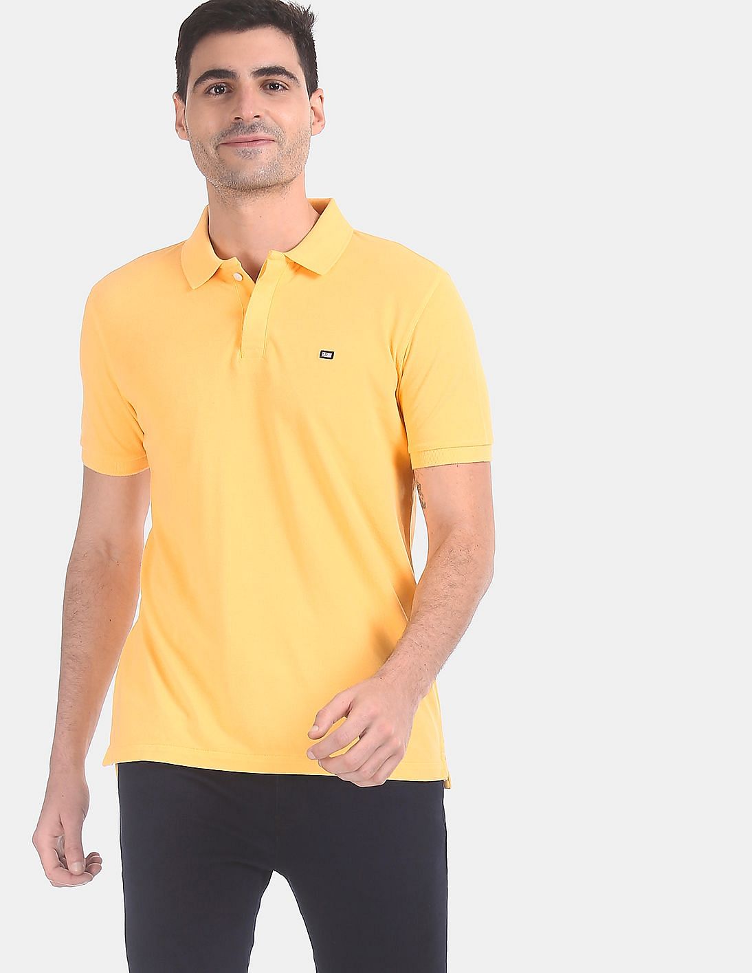 Buy Arrow Sports Yellow Concealed Placket Solid Polo Shirt - NNNOW.com