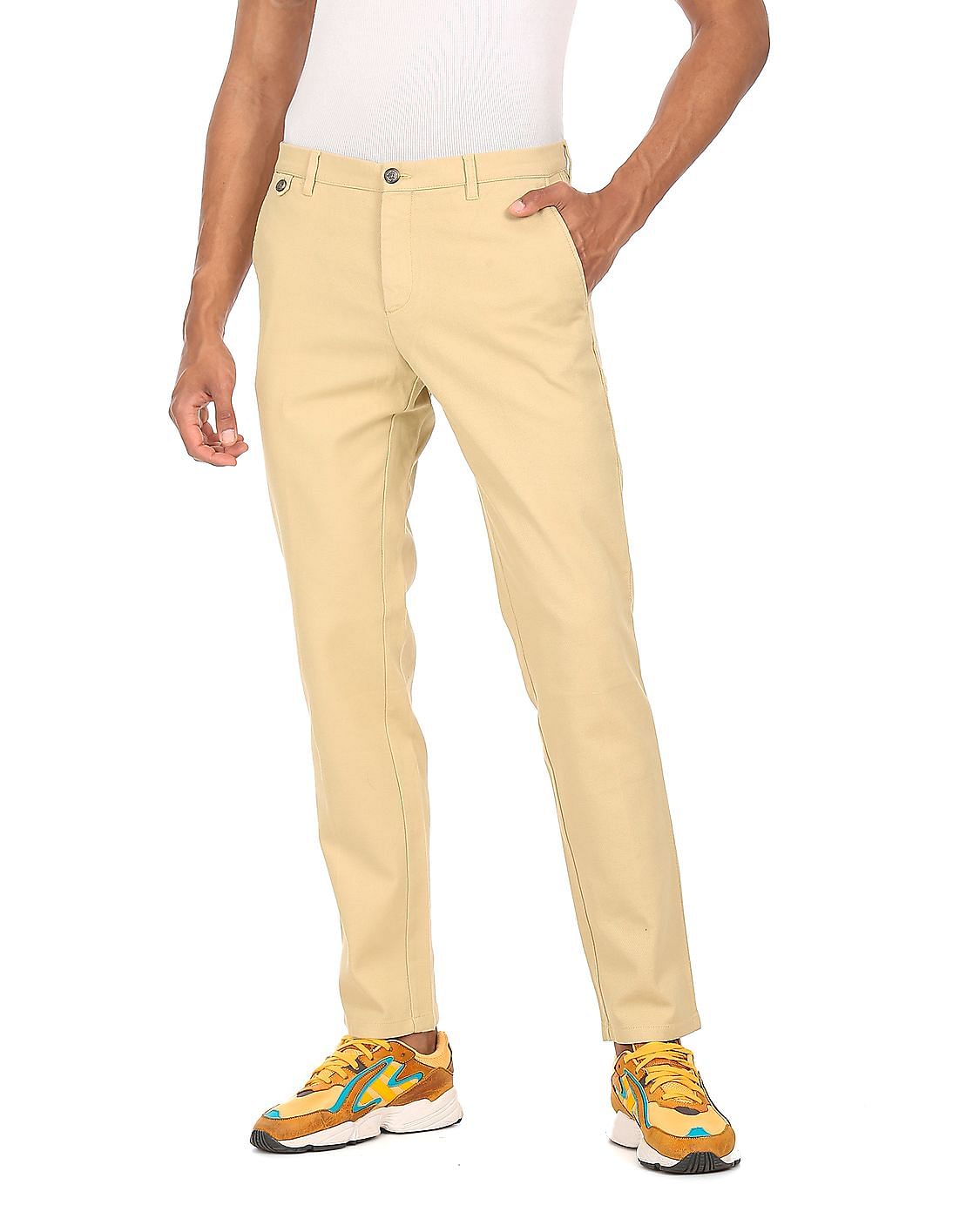 Buy Tommy Hilfiger Men Beige Mid Rise Slim Fit Solid Casual Trousers