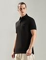 Tommy Hilfiger Solid Regular Fit Cotton Polo T-Shirt
