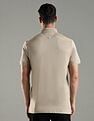 Tommy Hilfiger Solid Regular Fit Cotton Polo T-Shirt