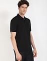Calvin Klein Jeans Striped Regular-Fit Polyester Polo T-Shirt